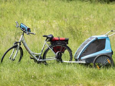 Rad+Reisen unisex Fahrrad mit Kinderanhnger