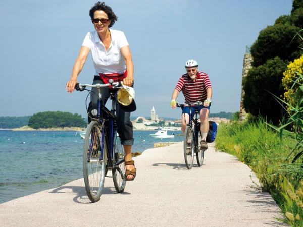 two cyclists in the kvarner bay