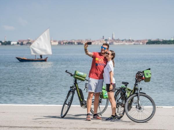 Cyclists in front of Venice