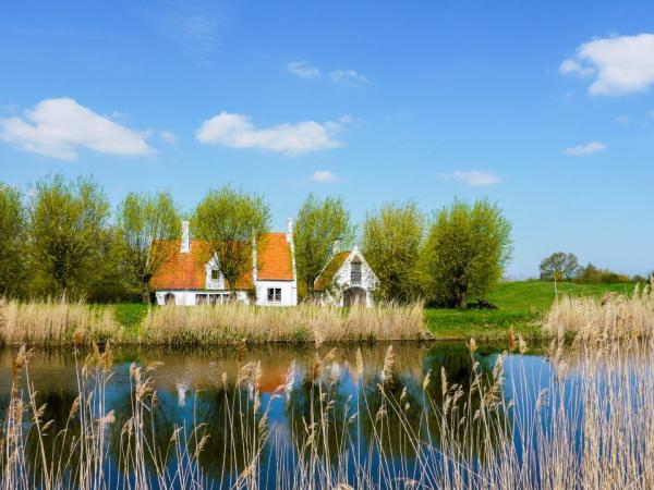 Rural houses by the canal between Bruges and Damme, West Flanders