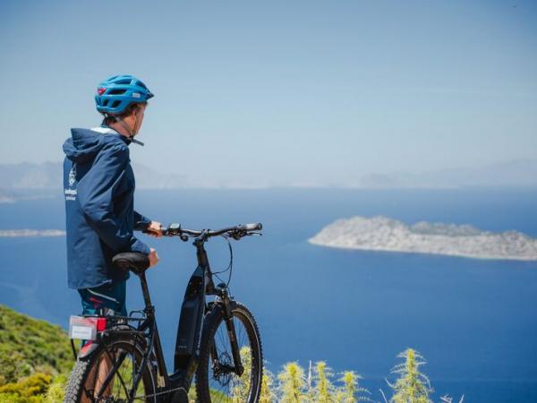 Cyclist viewing over the lycian coastline